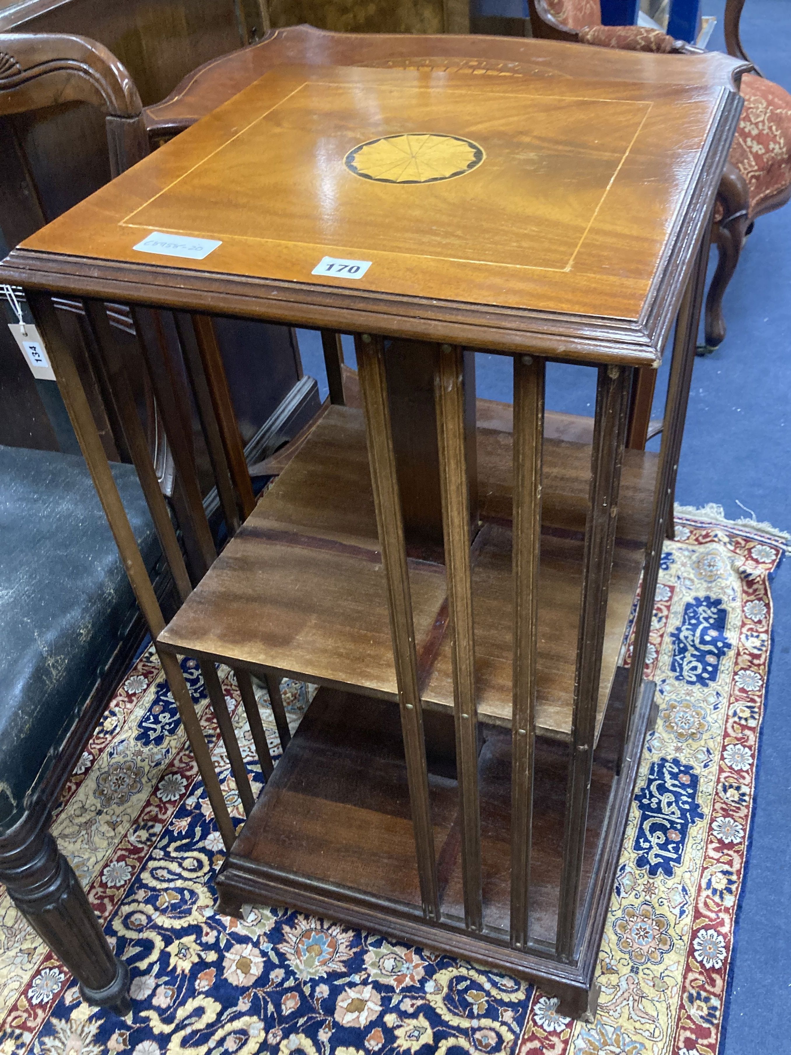 A reproduction inlaid mahogany revolving bookase, width 43cm, height 82cm